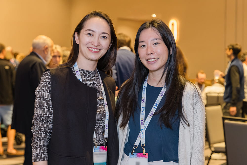 Attendees chatting in the ACT Lounge